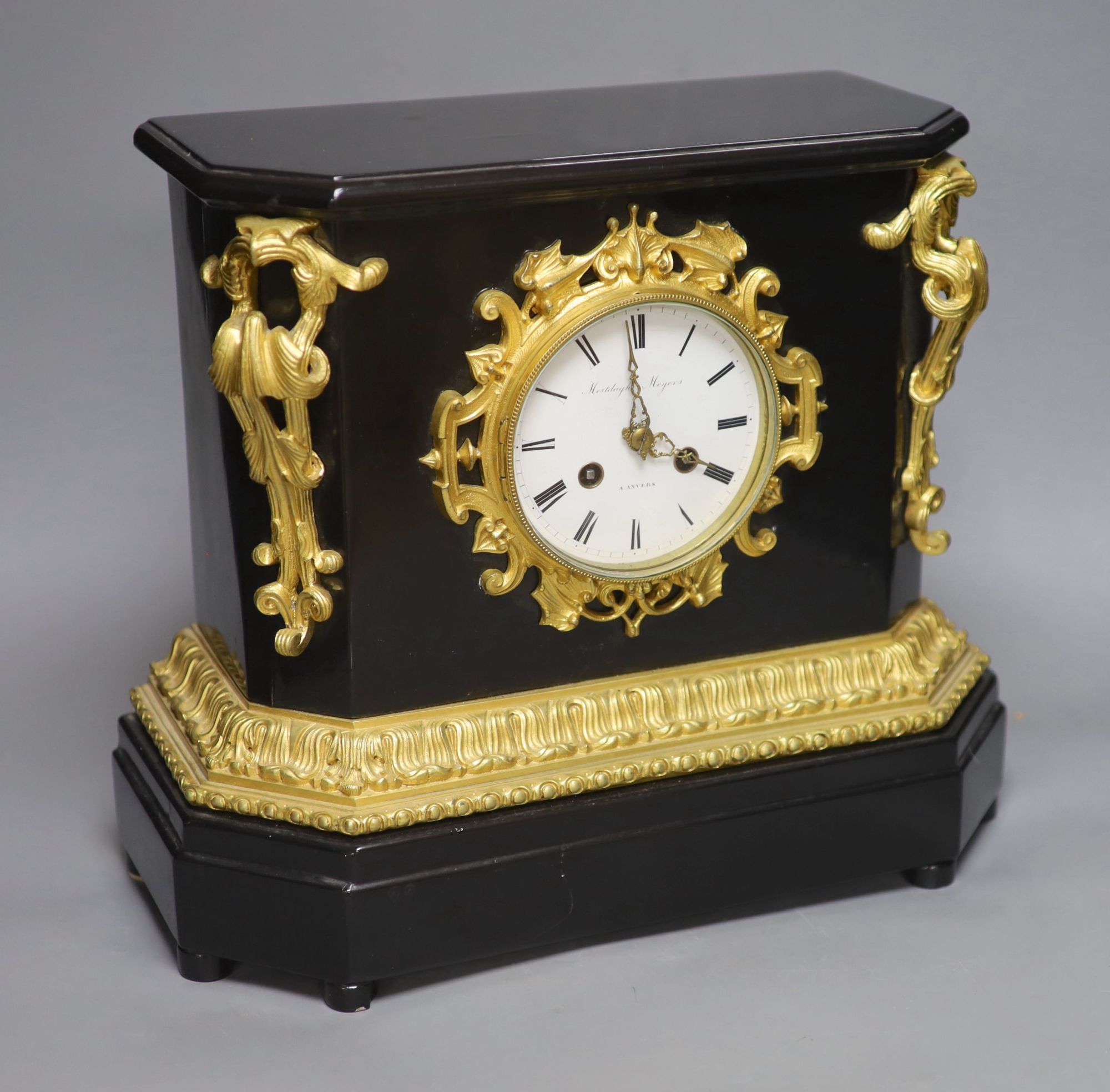 A late 19th century French ebonised and ormolu mounted mantel clock, height 33cm